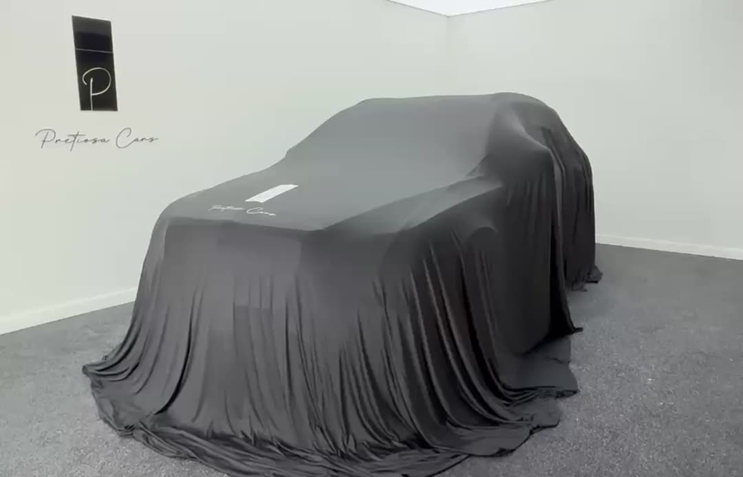 Bentley Bentayga under cover in the Pretiosa Cars delivery room