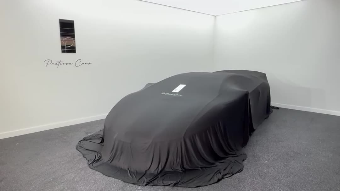 Lamborghini Aventador SV under cover in the Pretiosa Cars delivery room