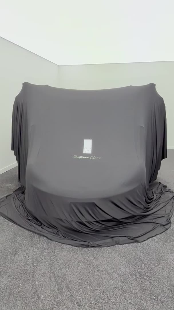 McLaren 600LT under cover in the Pretiosa Cars delivery room